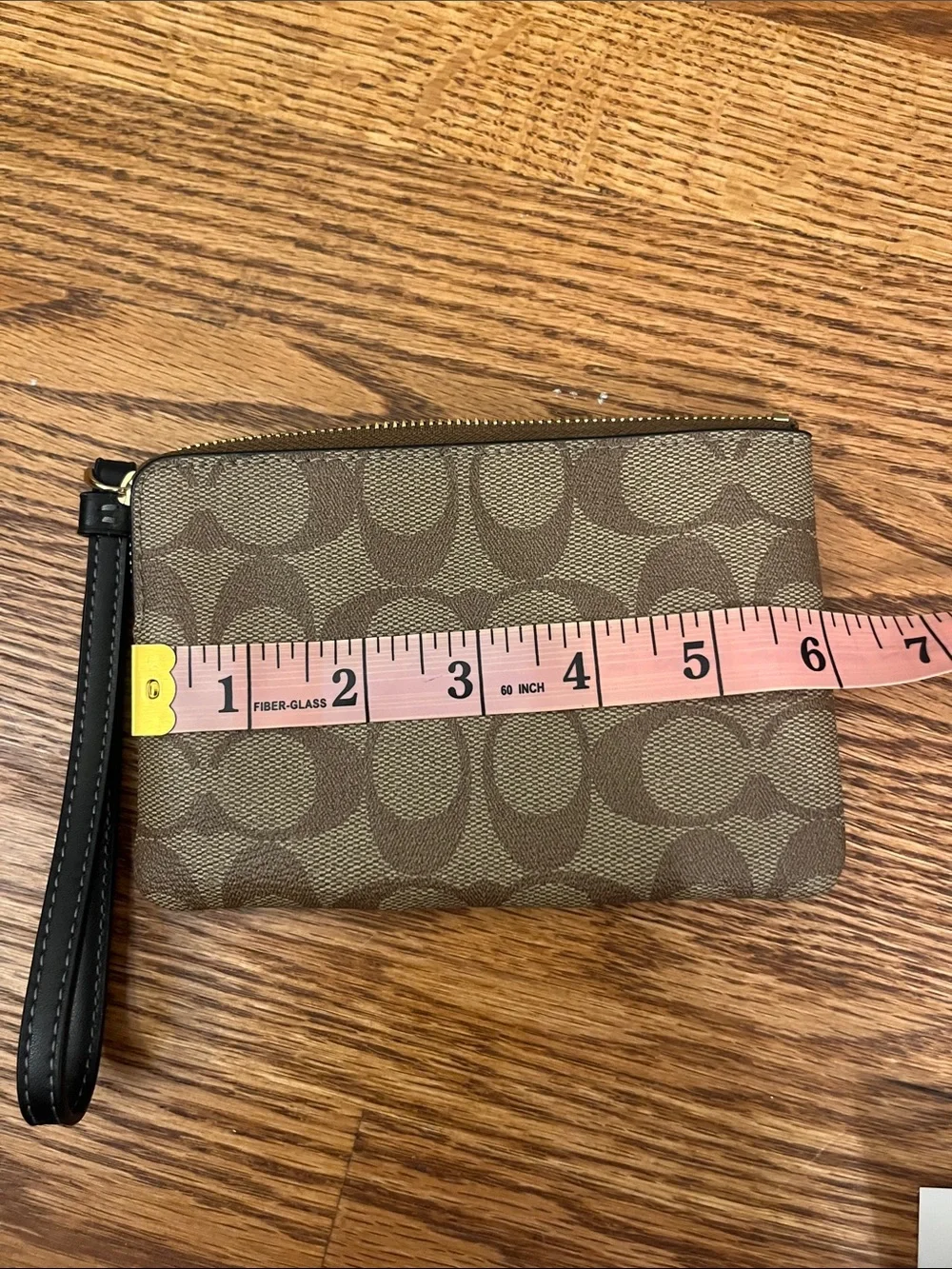 Coach Brown Monogram Wristlet with Black Stripe and Gold Hardware